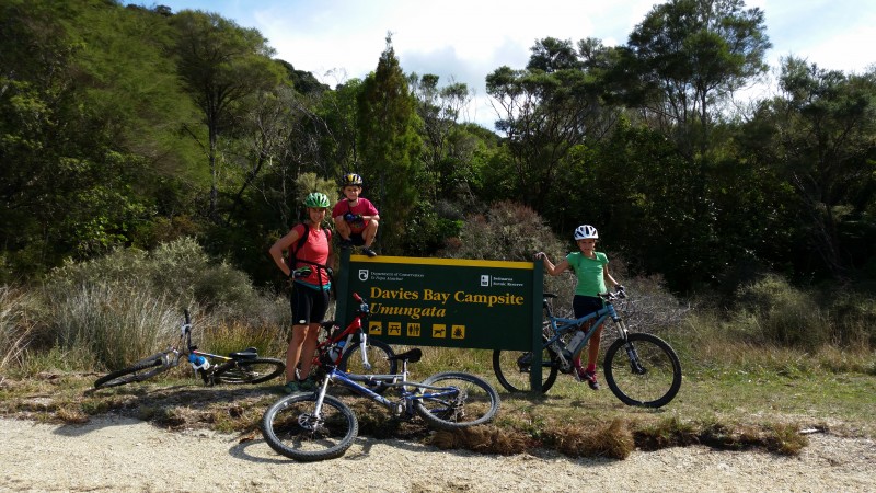 Happy kids at a food stop on The Queen Charlotte Track