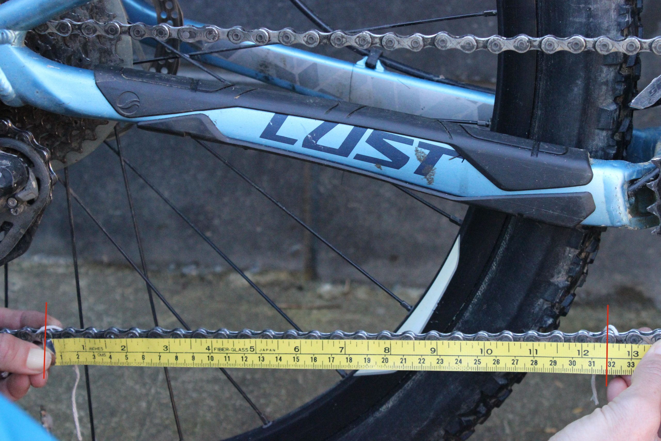 Testing bike chain length - tape measure • goRide.co.nz